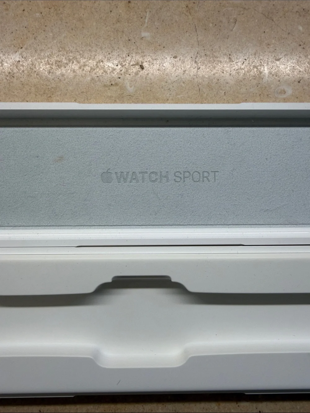 NWOT Apple Watch White Silicone Case with Debossed Apple Logo. Never used.